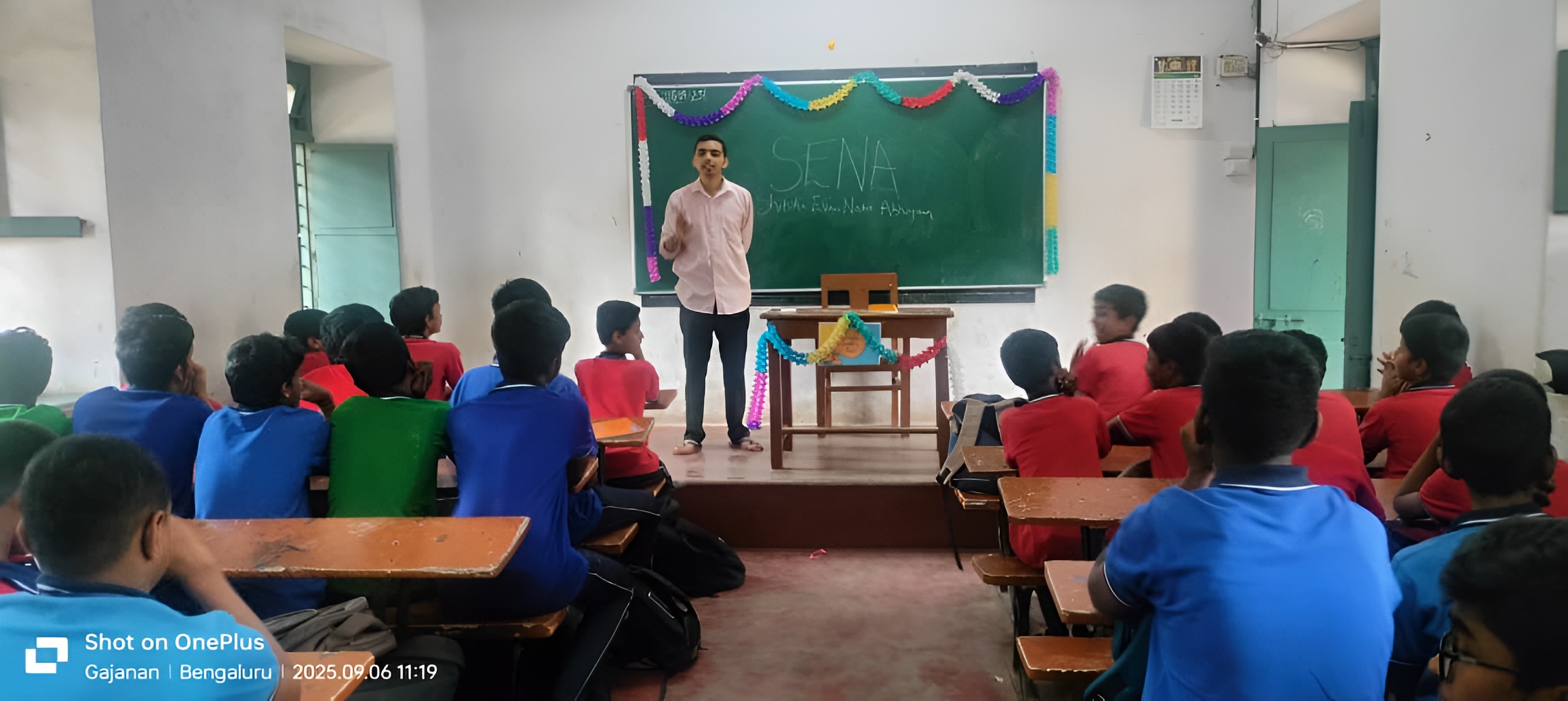 Teaching in classroom image